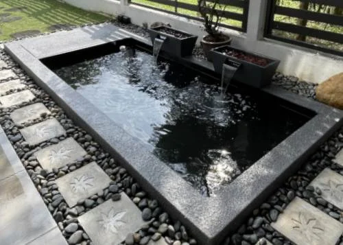 Kolam Ikan Minimalis Indoor dengan Air Terjun Kecil